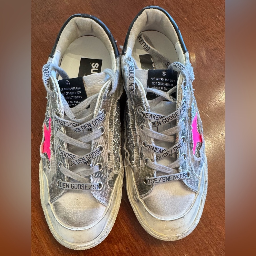 Golden Goose star studded shoe.